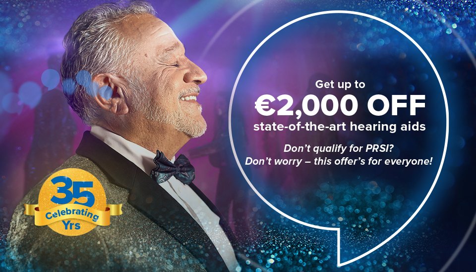 Man smiling celebrating getting up to €2000 off hearing aids