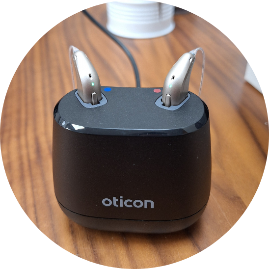 Oticon Intent Hearing Aid in rechargeable case