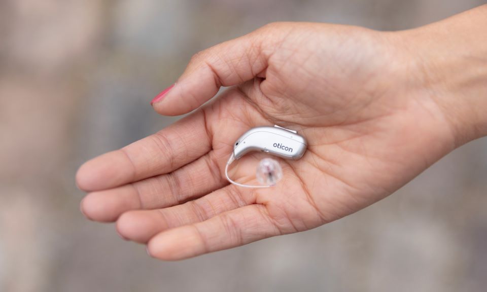 Hearing aid in hand