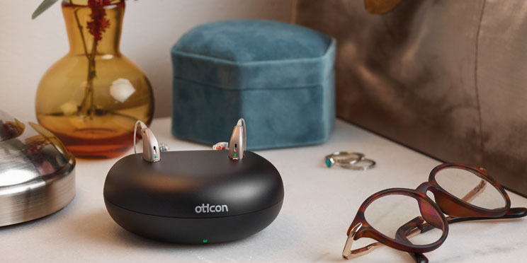 Image shows Oticon Opn S rechargeable hearing aids