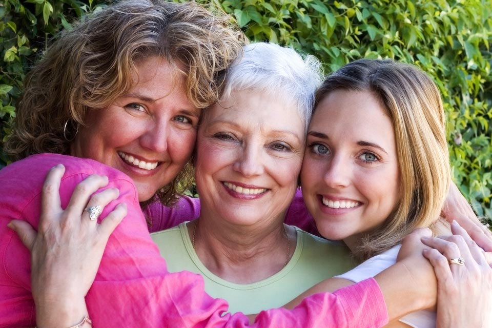 Image shows three generations of women