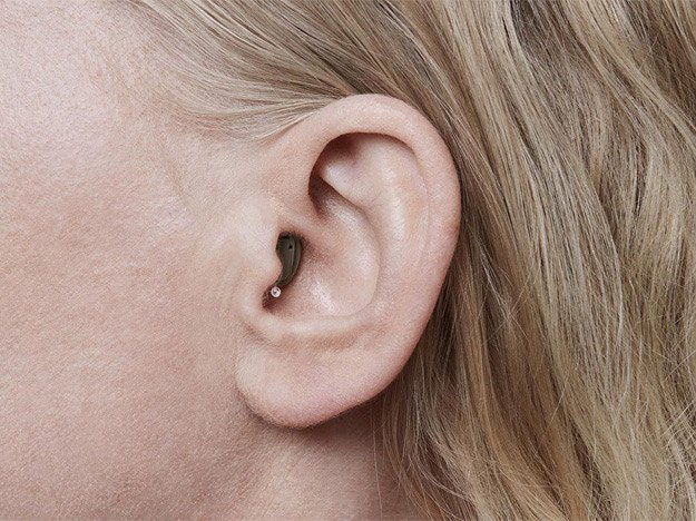 Invisible hearing aid completely in canal