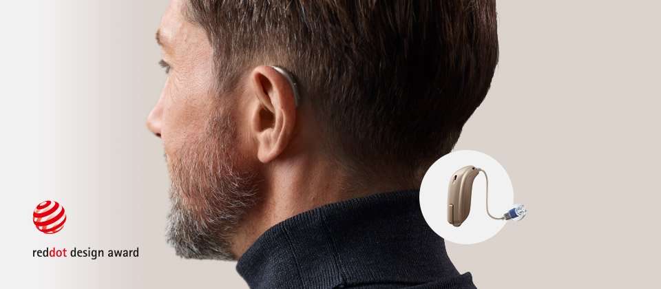 Man with oticon hearing aid