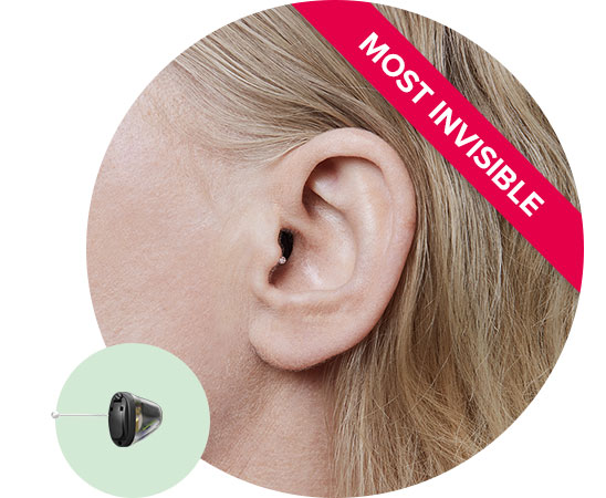 Image shows Invisible-in-the-canal hearing aid in ear